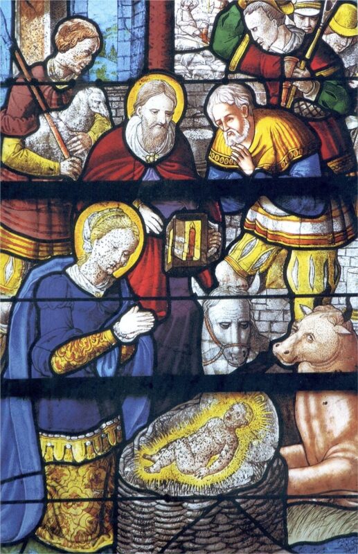 Âne personnifié sur un vitrail représentant  la Nativité  à Bazouges-la-Pérouse (35).